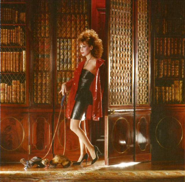 cristina with minks on leashes