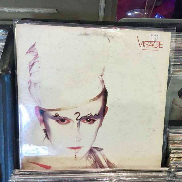 White 1981 cover variant of "Visage" in The Bomb Shelter